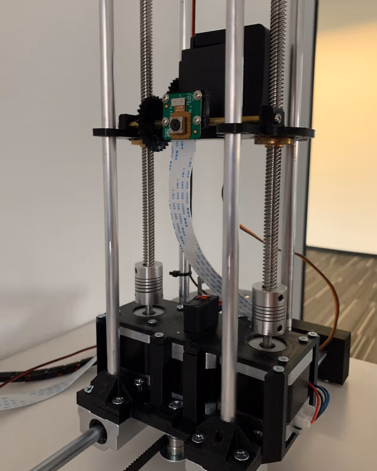 Vertical camera axis with two lead screws, flexible shaft couplings and NEMA stepper motors